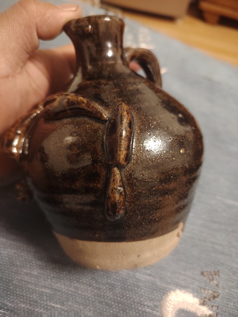 古玩陶瓷褐釉人面壺真品鑒賞圖