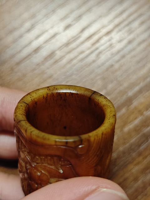 古玩字畫骨質陽雕班指真品鑒賞圖