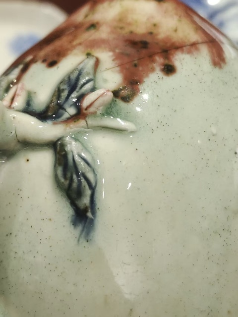 古玩陶瓷乾隆釉下三彩倒流壺真品鑒賞圖