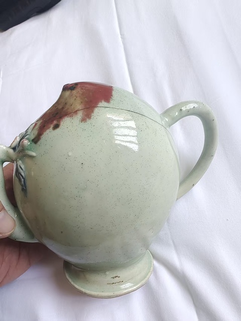 古玩陶瓷乾隆釉下三彩倒流壺真品鑒賞圖