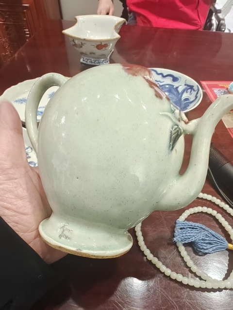 古玩陶瓷乾隆釉下三彩倒流壺真品鑒賞圖