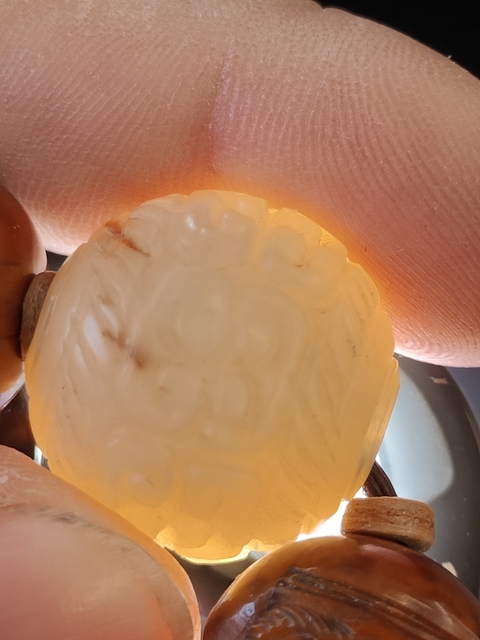 古玩玉器和田玉雕“卷云紋珠”真品鑒賞圖