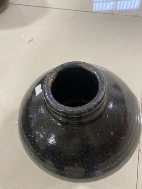 古玩陶瓷窯變黑釉高領罐真品鑒賞圖