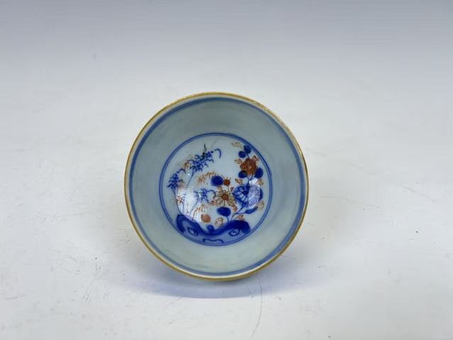 古玩陶瓷清康熙·青花洞石花卉礬紅描金杯碟真品鑒賞圖