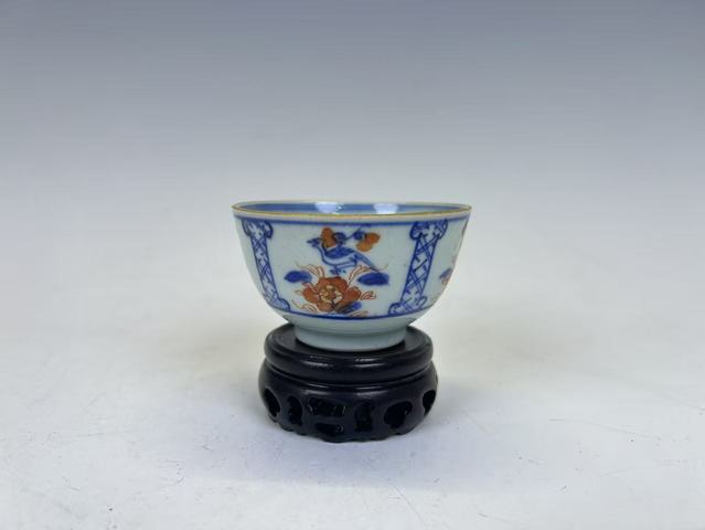 古玩陶瓷清康熙·青花洞石花卉礬紅描金杯碟真品鑒賞圖