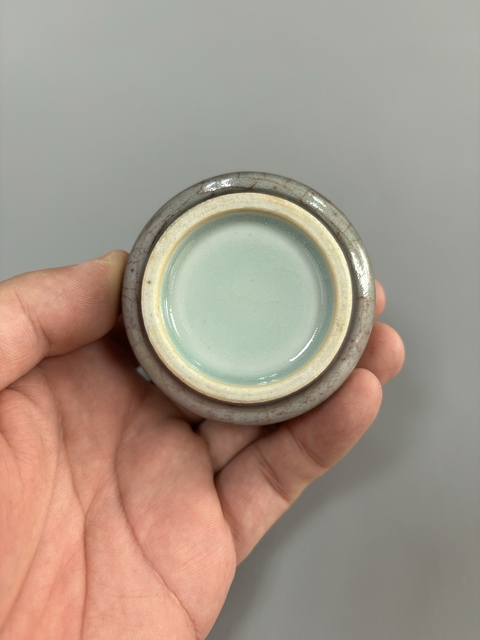 古玩陶瓷豇豆紅釉加粉彩博古花卉水盂真品鑒賞圖