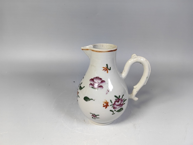 古玩陶瓷清乾隆粉彩花卉紋奶壺真品鑒賞圖