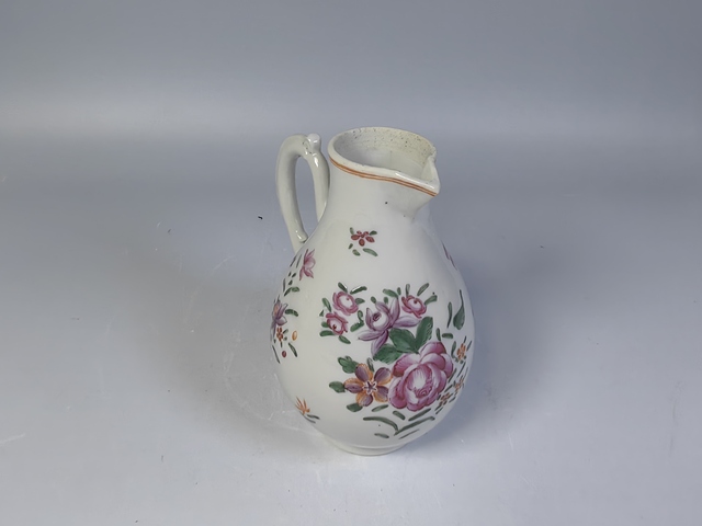 古玩陶瓷清乾隆粉彩花卉紋奶壺真品鑒賞圖