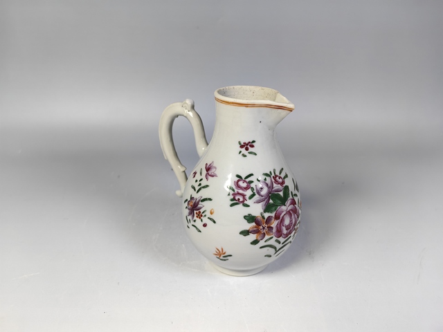 古玩陶瓷清乾隆粉彩花卉紋奶壺真品鑒賞圖