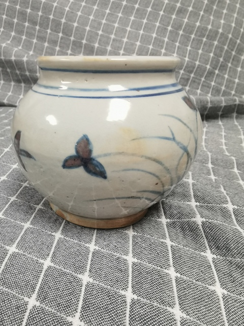 古玩陶瓷青花釉里紅花卉紋罐真品鑒賞圖