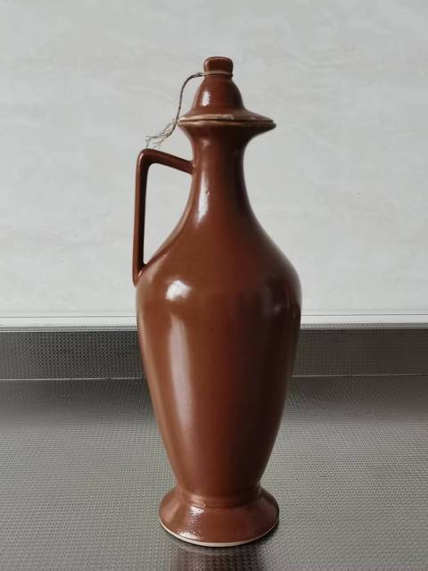 古玩陶瓷紫金釉執(zhí)壺真品鑒賞圖