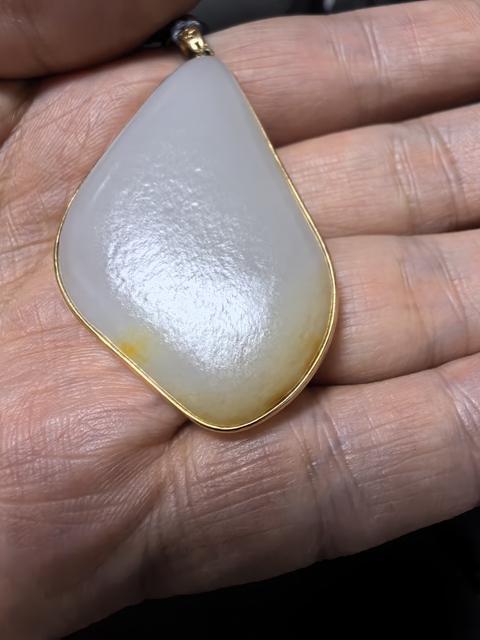 古玩玉器當代和田白玉金鑲玉吊墜真品鑒賞圖