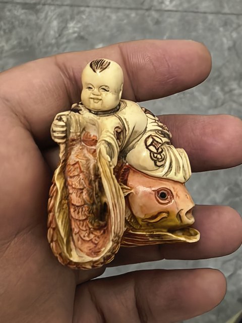 古玩雜項猛犸象牙童子抱魚真品鑒賞圖