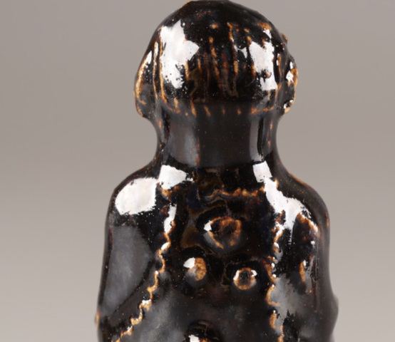 古玩陶瓷褐釉人物造像真品鑒賞圖