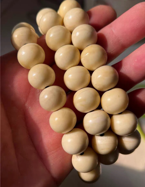 古玩雜項(xiàng)海象牙手串真品鑒賞圖