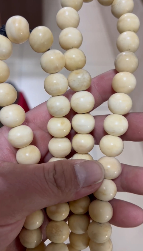 古玩雜項(xiàng)海象牙手串真品鑒賞圖