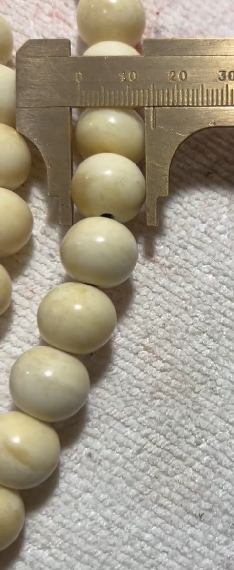 古玩雜項(xiàng)海象牙手串真品鑒賞圖