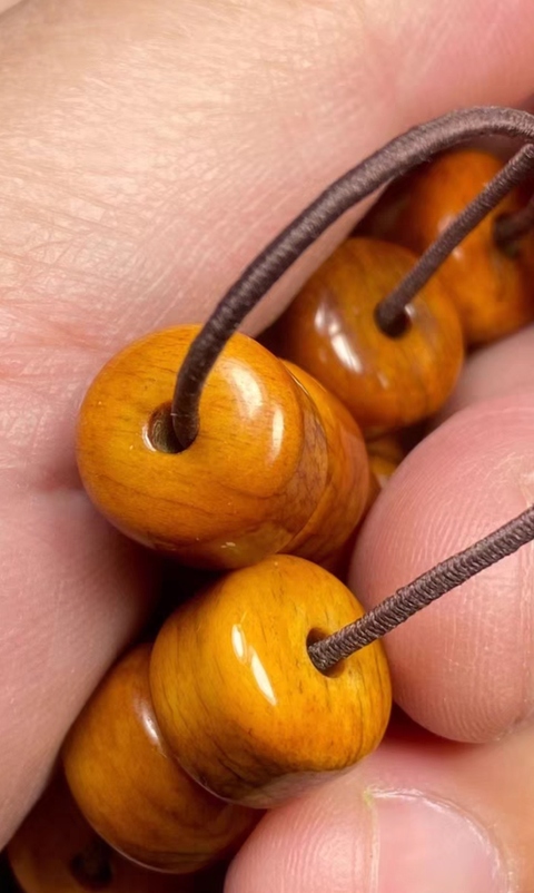 古玩雜項烤色駝骨珠真品鑒賞圖