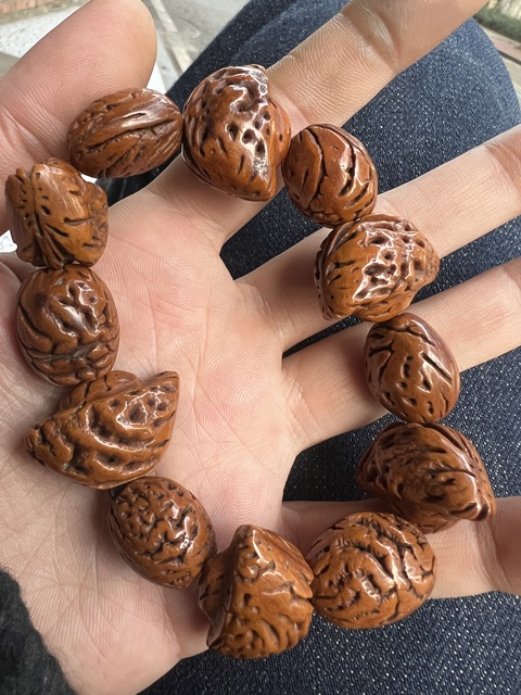 古玩雜項桃核手串真品鑒賞圖