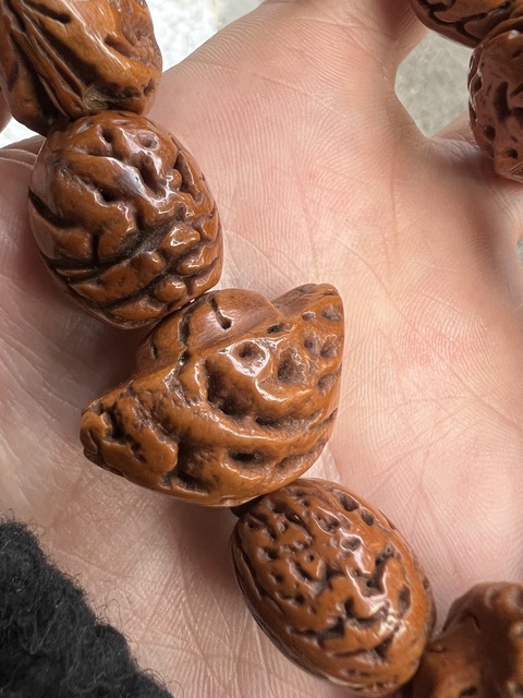 古玩雜項桃核手串真品鑒賞圖