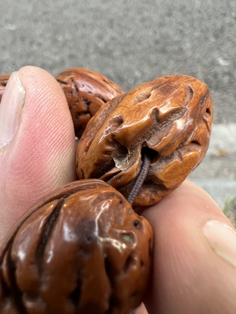 古玩雜項桃核手串真品鑒賞圖