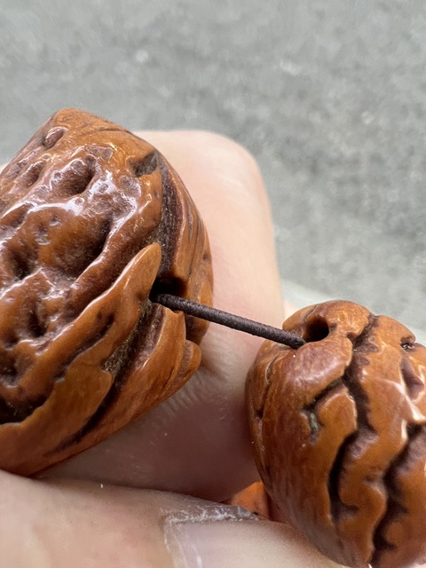 古玩雜項桃核手串真品鑒賞圖